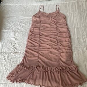 This is a pastel taupe party or prom dress.It run small in size.